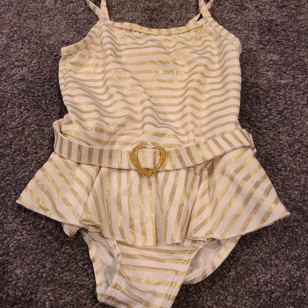 Girls one-piece gold stripe bathing suit
Size 5